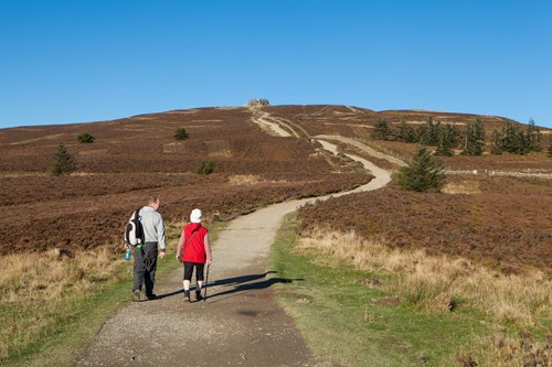 Couple walking towards Jubliee Tower