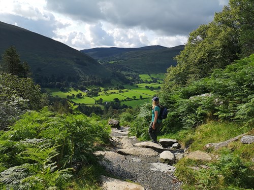 Woman walking down Minffordd Path