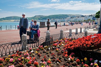 People walking along the promenade Llandudno